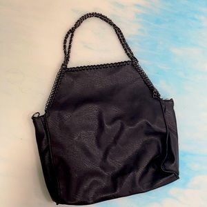 A black shoulder bag from French brand U collection. Comfortable bag for ladies